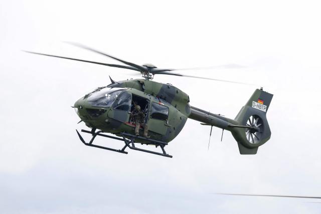 A Helicopter H145M of the German Army Bundeswehr and soldiers perform for the media during the Defence Summit 2026 at Airbus Defence and Space GmbH in Manching, Bavaria, southern Germany, on May 20, 2026. (Photo by Michaela STACHE / AFP)