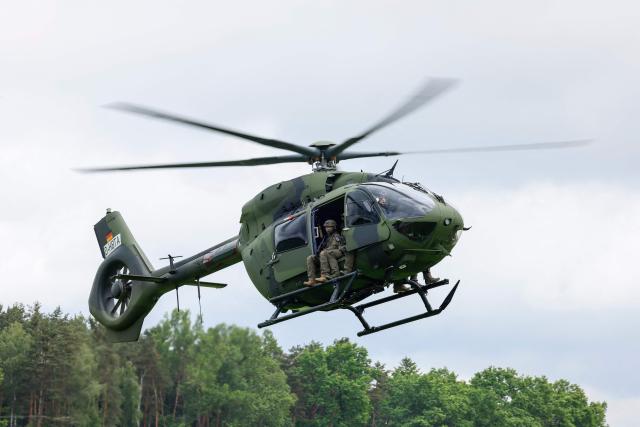 A Helicopter H145M of the German Army Bundeswehr and soldiers perform for the media during the Defence Summit 2026 at Airbus Defence and Space GmbH in Manching, Bavaria, southern Germany, on May 20, 2026. (Photo by Michaela STACHE / AFP)
