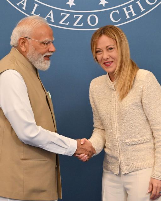 India's Prime Minister Narendra Modi and Italy’s Prime Minister Giorgia Meloni greet each other at the end of a press conference at Villa Doria Pamphili in Rome on May 20, 2026. (Photo by Alberto PIZZOLI / AFP)