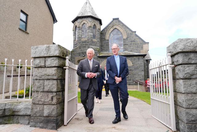 Britain's King Charles III leaves after visiting the Pantry Foodbank at the Donard Methodist Church in Newcastle, south of Belfast, Northern Ireland on May 20, 2026, on the second day of a three-day royal visit to Northern Ireland. (Photo by Aaron Chown / POOL / AFP)