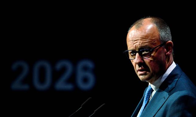 German Chancellor Friedrich Merz addresses guests to open a so-called eSummit organised by the ZVEI Association of the German electro and digital industry, in Berlin on May 20, 2026. (Photo by Tobias SCHWARZ / AFP)