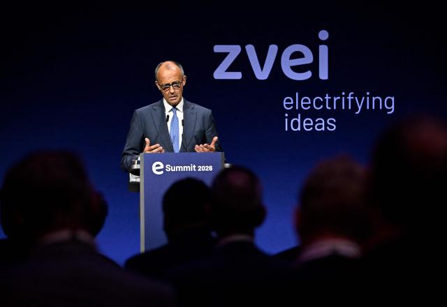 German Chancellor Friedrich Merz addresses guests to open a so-called eSummit organised by the ZVEI Association of the German electro and digital industry, in Berlin on May 20, 2026. (Photo by Tobias SCHWARZ / AFP)