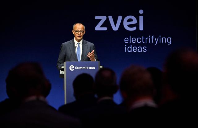 German Chancellor Friedrich Merz addresses guests to open a so-called eSummit organised by the ZVEI Association of the German electro and digital industry, in Berlin on May 20, 2026. (Photo by Tobias SCHWARZ / AFP)