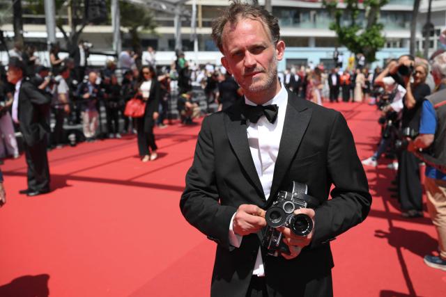 French director and screenwriter Emmanuel Marre arrives for the screening of the film "Notre Salut" (A Man of His Time) at the 79th edition of the Cannes Film Festival in Cannes, southern France on May 20, 2026. (Photo by Olivier CHASSIGNOLE / AFP)