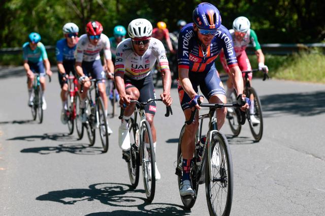 Team Picnic PostNL French rider Warren Barguil (R) rides in a breakaway during the 11th stage of the Giro d'Italia 2026 - Tour of Italy cycling race between Porcari and Chiavari, Italy, on May 20, 2026. (Photo by Luca Bettini / AFP)