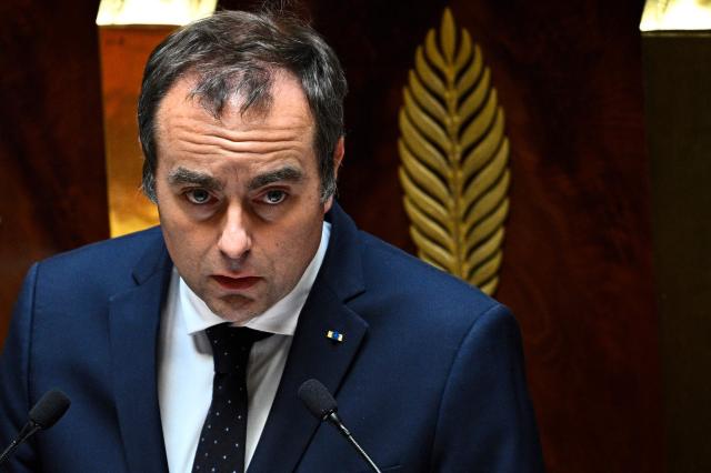 France's Prime Minister Sebastien Lecornu delivers a speech ahead of a debate focused on the "Draft law on the updating of the electorate for Congress and Provincial Assemblies elections in New Caledonia" at the end of a session of questions to the government at The National Assembly, France's lower house of parliament in Paris on May 20, 2026. (Photo by JULIEN DE ROSA / AFP)