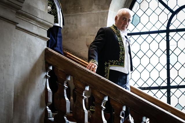 French chef Guy Savoy arrives for his investiture ceremony at the Académie des Beaux-Arts in Paris, on May 20, 2026. (Photo by SIMON WOHLFAHRT / AFP)