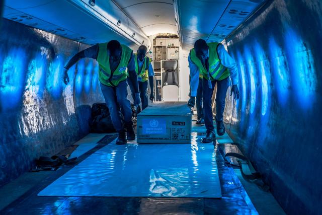 Ground crew load medical supplies onto a United Nations Humanitarian Air Service (UNHAS) operated charter plane bound for Bunia in eastern Democratic Republic of Congo as the World Health Organization (WHO) coordinates delivery as part of the response to an Ebola outbreak, at Jomo Kenyatta International Airport in Nairobi on May 20, 2026. The World Health Organization on May 19, 2026 voiced concern about the "scale and speed" of an Ebola outbreak that has killed more than 130 people in the Democratic Republic of Congo, warning it could be lengthy.
Ebola has killed more than 15,000 people in Africa in the past half-century, and the UN health agency declared the latest surge of the highly contagious haemorrhagic fever an international health emergency. (Photo by Tony KARUMBA / AFP)