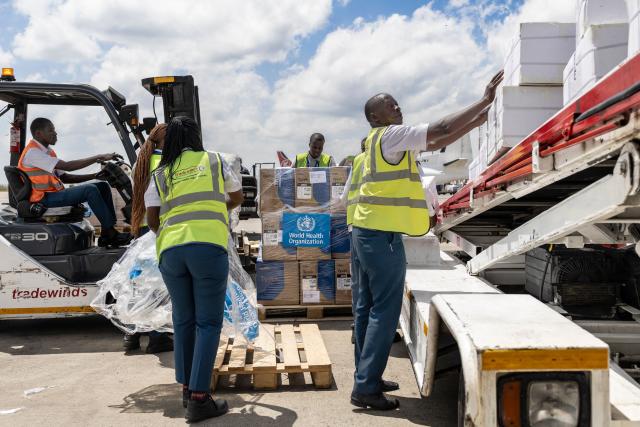 Ground crew load medical supplies onto a United Nations Humanitarian Air Service (UNHAS) operated charter plane bound for Bunia in eastern Democratic Republic of Congo as the World Health Organization (WHO) coordinates delivery as part of the response to an Ebola outbreak, at Jomo Kenyatta International Airport in Nairobi on May 20, 2026. The World Health Organization on May 19, 2026 voiced concern about the "scale and speed" of an Ebola outbreak that has killed more than 130 people in the Democratic Republic of Congo, warning it could be lengthy.
Ebola has killed more than 15,000 people in Africa in the past half-century, and the UN health agency declared the latest surge of the highly contagious haemorrhagic fever an international health emergency. (Photo by Tony KARUMBA / AFP)