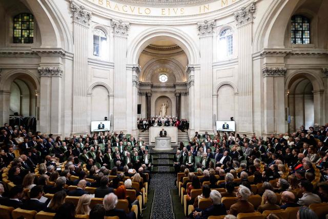 French chef Guy Savoy (C) delivers a speech during his investiture ceremony at the Académie des Beaux-Arts in Paris, on May 20, 2026. (Photo by SIMON WOHLFAHRT / AFP)