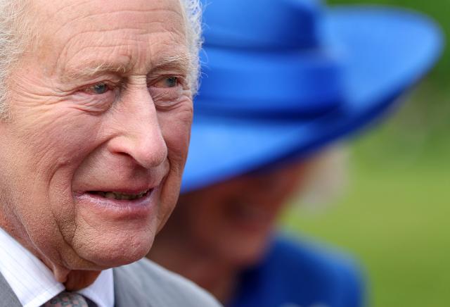 Britain's King Charles III and Britain's Queen Camilla attend a Garden Party at Hillsborough Castle, in Hillsborough, Northern Ireland on May 20, 2026, on the second day of a three-day royal visit to Northern Ireland. (Photo by Chris Jackson / POOL / AFP)