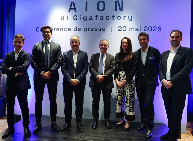 (From L) Chief Strategy Officer of the Orange Group Jйrфme Berger, Co-founder and Executive Chairman of Artefact Vincent Luciani, General Manager of Bull Emmanuel Le Roux, Head of Infrastructure Europe Ardian Benoоt Gaillochet, Chief Operating Officer of Scaleway Albane Bruyas, CEO of the Iliad Group Thomas Reynaud and CEO of Scaleway Damien Lucas pose following a press conference to announce the creation of a consortium to support the bid for an European AI Gigafactory in France, in Paris on May 20, 2026. Named “AION,” the consortium of 28 companies will submit a French proposal in response to a call for tenders from the European Commission, which is expected to be published shortly, with the aim of creating in Europe a handful of mega computing infrastructure projects that are essential for the development of AI. (Photo by Anne-Christine POUJOULAT / AFP)