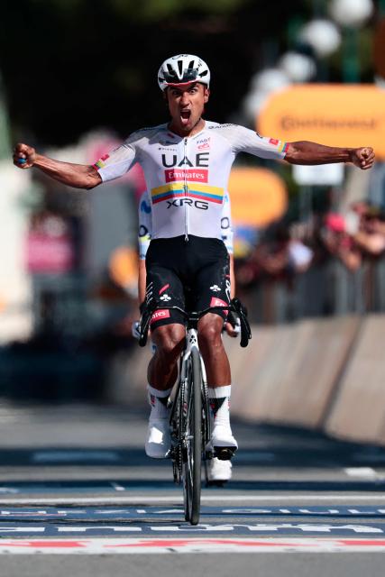 UAE Team Emirates - XRG Ecuadorian rider Jhonatan Narvaez celebrates as he crosses the finish line to win the 11th stage of the Giro d'Italia 2026 - Tour of Italy cycling race between Porcari and Chiavari, Italy, on May 20, 2026. (Photo by Luca Bettini / AFP)