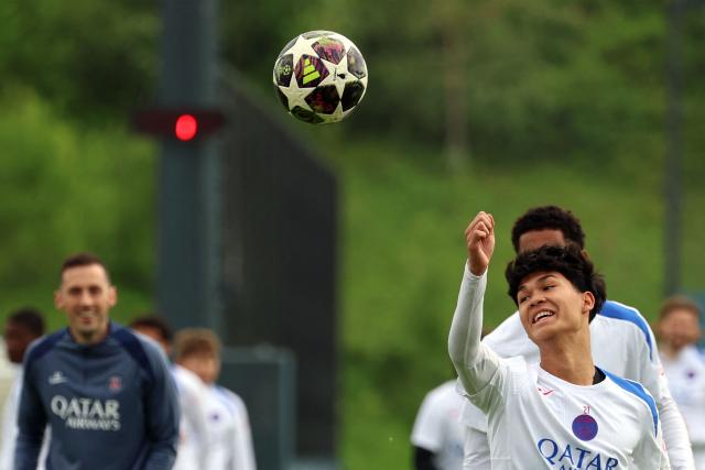 Paris Saint-Germain's Spanish midfielder #27 Dro Fernandez practices during a training session ahead of their upcoming UEFA Champions League final match against English football club Arsenal FC at the PSG Campus in Poissy, north-west of Paris on May 20, 2026. (Photo by FRANCK FIFE / AFP)