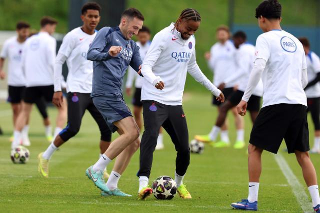 Paris Saint-Germain's French forward #29 Bradley Barcola (C) practices during a training session ahead of their upcoming UEFA Champions League final match against English football club Arsenal FC at the PSG Campus in Poissy, north-west of Paris on May 20, 2026. (Photo by FRANCK FIFE / AFP)