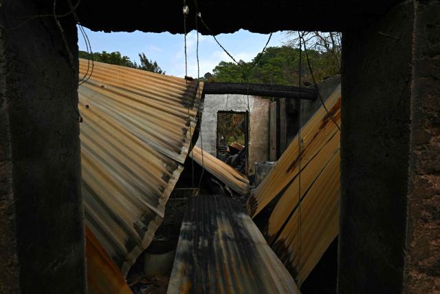 View of rubble at a home after a drone attack allegedly by Los Ardillos cartel in Tula, Guerrero state, Mexico, on May 19, 2026. (Photo by YURI CORTEZ / AFP)