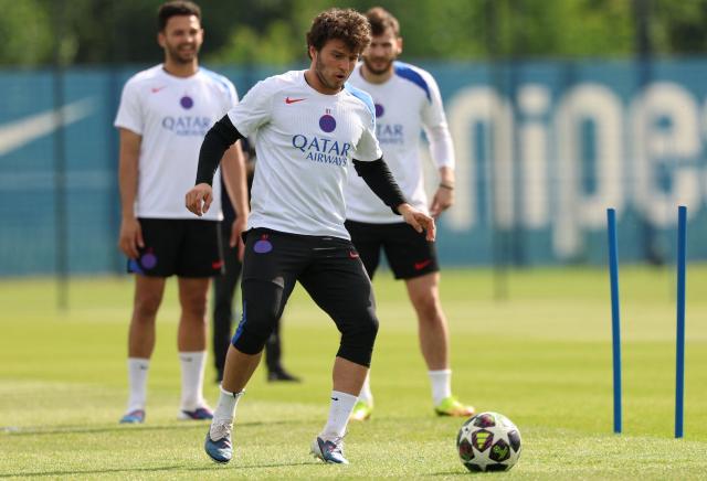 Paris Saint-Germain's Portuguese midfielder #87 Joao Neves practices during a training session ahead of their upcoming UEFA Champions League final match against English football club Arsenal FC at the PSG Campus in Poissy, north-west of Paris on May 20, 2026. (Photo by FRANCK FIFE / AFP)