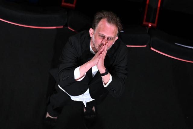 French director and screenwriter Emmanuel Marre reacts after the screening of the film "Notre Salut" (A Man of His Time) at the 79th edition of the Cannes Film Festival in Cannes, southern France on May 20, 2026. (Photo by Antonin THUILLIER / AFP)