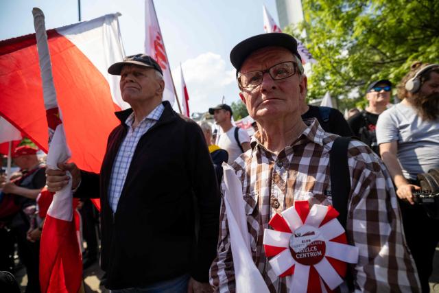 Protesters take part in a demonstration of the “Solidarnosc” (Solidarity) trade union and right-wing supporters against the European Green Deal and the policies of Donald Tusk’s government in front the Polish parliament, the Sejm, in Warsaw, Poland, on May 20, 2026. (Photo by Wojtek RADWANSKI / AFP)