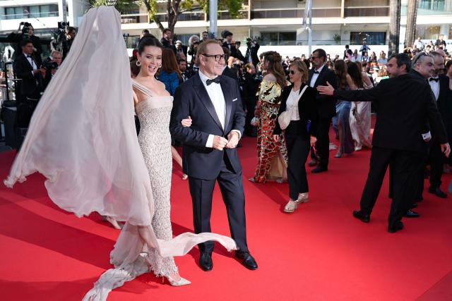 US actor Kevin Spacey (R) arrives for the screening of the film "La Bataille de Gaulle : L'age de fer" (De Gaulle: Tilting Iron) at the 79th edition of the Cannes Film Festival in Cannes, southern France on May 20, 2026. (Photo by Thibaud MORITZ / AFP)