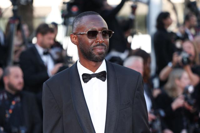 French director, screenwriter and actor Thomas Ngijol arrives for the screening of the film "La Bataille de Gaulle : L'age de fer" (De Gaulle: Tilting Iron) at the 79th edition of the Cannes Film Festival in Cannes, southern France on May 20, 2026. (Photo by Sameer AL-DOUMY / AFP)