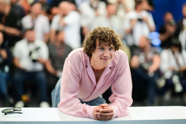 Latvian screenwriter and actor Karlis Arnolds Avots poses during a photocall of the film "Ula" (Ulya) at the 79th edition of the Cannes Film Festival in Cannes, southern France on May 21, 2026. (Photo by Olivier CHASSIGNOLE / AFP)