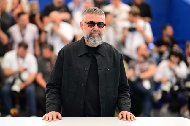 Latvian director Viesturs Kairiss poses during a photocall of the film "Ula" (Ulya) at the 79th edition of the Cannes Film Festival in Cannes, southern France on May 21, 2026. (Photo by Olivier CHASSIGNOLE / AFP)