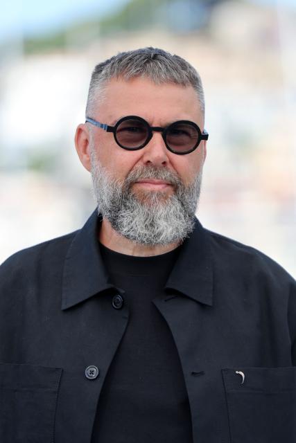 Latvian director Viesturs Kairiss poses during a photocall of the film "Ula" (Ulya) at the 79th edition of the Cannes Film Festival in Cannes, southern France on May 21, 2026. (Photo by Thibaud MORITZ / AFP)