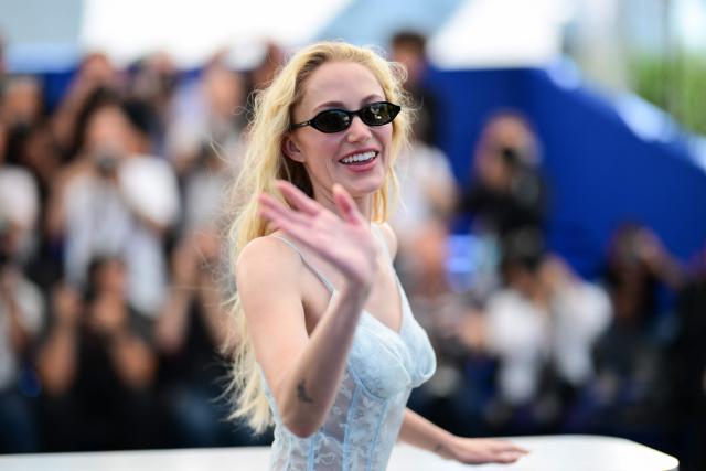 US actress Maika Monroe poses during a photocall of the film "Victorian Psycho" at the 79th edition of the Cannes Film Festival in Cannes, southern France on May 21, 2026. (Photo by Olivier CHASSIGNOLE / AFP)