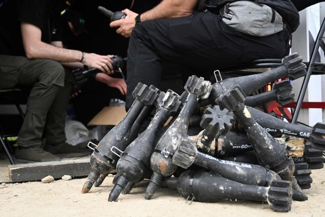 Technicians prepare dummy explosives during the “Wild Drones” racing competition — designed to simulate battlefield conditions — in Truskavets, Lviv region, on May 20, 2026, amid Russia’s invasion of Ukraine. (Photo by YURIY DYACHYSHYN / AFP)