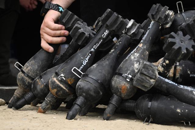 Technicians prepare dummy explosives during the “Wild Drones” racing competition — designed to simulate battlefield conditions — in Truskavets, Lviv region, on May 20, 2026, amid Russia’s invasion of Ukraine. (Photo by YURIY DYACHYSHYN / AFP)