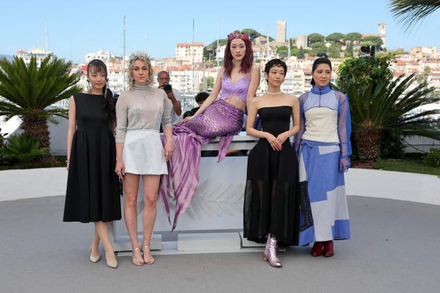 (From L) Actress Hanna Muro, Greek director and screenwriter Konstantina Kotzamani, Japanese actress Arisa Sasaki, Japanese actress Riku Nakamura and German-Japanese actress Melina Mardini pose during a photocall of the film "Titanic Ocean" at the 79th edition of the Cannes Film Festival in Cannes, southern France on May 21, 2026. (Photo by Thibaud MORITZ / AFP)
