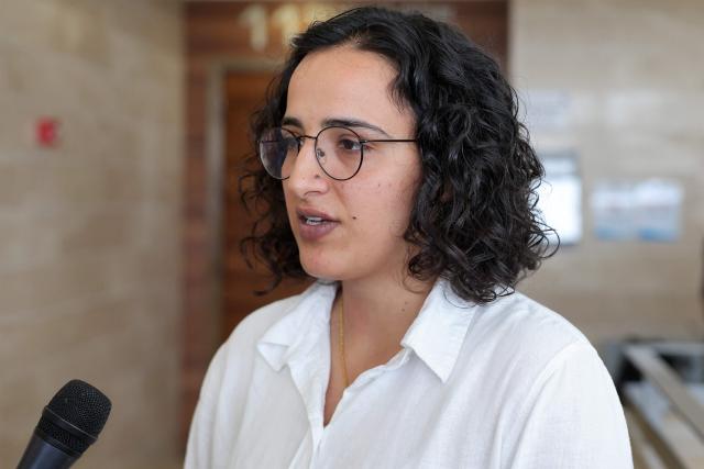 Hadeel Abu Saleh, lawyer at Adalah - The Legal Centre for Arab Minority Rights in Israel, who represents Israeli activist Zohar Chamberlain Regev, member of a flotilla bound for Gaza and one of dozens of activists that were detained when the flotilla was intercepted by Israeli forces, speaks as her client appears at the Ashkelon Trial Court in Ashkelon in southern Israel on May 21, 2026. (Photo by Jack GUEZ / AFP)