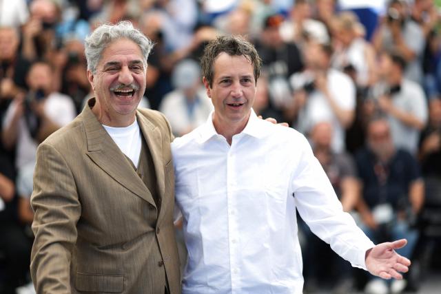 French-Armenian actor Simon Abkarian and French director and screenwriter Antonin Baudry  pose during a photocall of the film "La Bataille de Gaulle : L'age de fer" (De Gaulle: Tilting Iron) at the 79th edition of the Cannes Film Festival in Cannes, southern France on May 21, 2026. (Photo by Sameer AL-DOUMY / AFP)