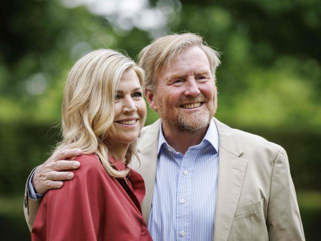 Dutch King Willem-Alexander (R) and Queen Maxima (L) pose during the traditional royal family photo session in the Dutch Garden in Clingendael Park in The Hague on May 21, 2026. (Photo by Robin VAN LONKHUIJSEN / ANP / AFP) / Netherlands OUT