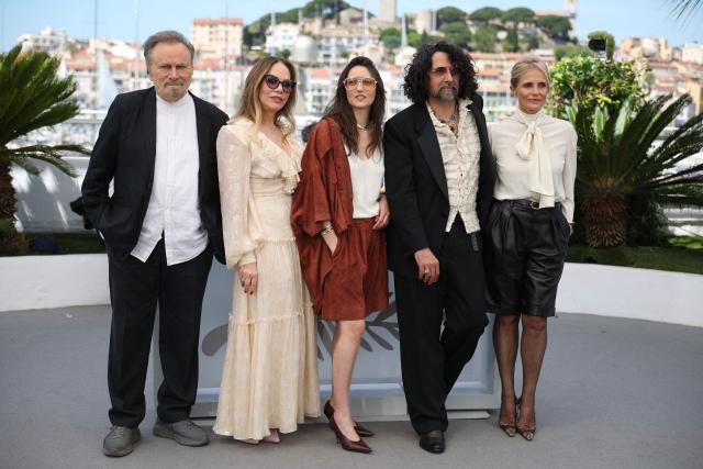 (From L) Italian actor Franco Nero, Italian actress Ornella Muti, Italian actress Martina Scrinzi, French director and screenwriter Bertrand Mandico and Italian actress Isabella Ferrari pose during a photocall of the film "Roma Elastica" at the 79th edition of the Cannes Film Festival in Cannes, southern France on May 21, 2026. (Photo by Valery HACHE / AFP)