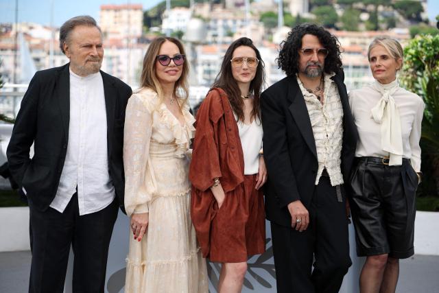 (From L) Italian actor Franco Nero, Italian actress Ornella Muti, Italian actress Martina Scrinzi, French director and screenwriter Bertrand Mandico and Italian actress Isabella Ferrari pose during a photocall of the film "Roma Elastica" at the 79th edition of the Cannes Film Festival in Cannes, southern France on May 21, 2026. (Photo by Valery HACHE / AFP)