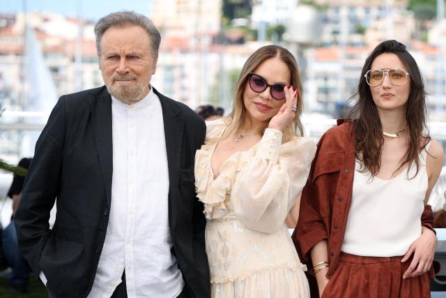 (From L) Italian actor Franco Nero, Italian actress Ornella Muti and Italian actress Martina Scrinzi pose during a photocall of the film "Roma Elastica" at the 79th edition of the Cannes Film Festival in Cannes, southern France on May 21, 2026. (Photo by Valery HACHE / AFP)