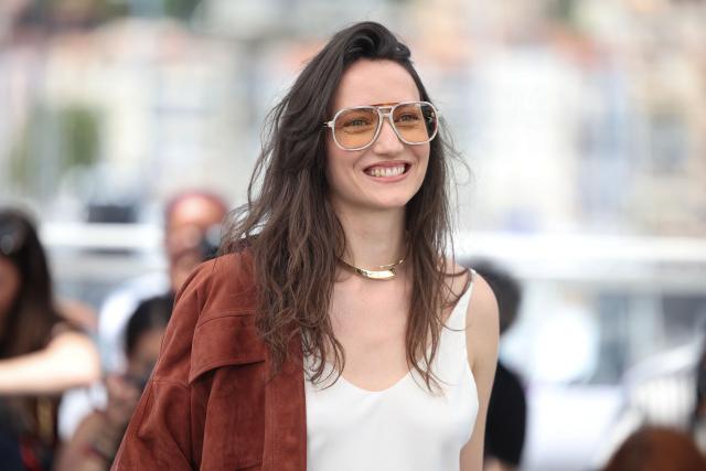 Italian actress Martina Scrinzi poses during a photocall of the film "Roma Elastica" at the 79th edition of the Cannes Film Festival in Cannes, southern France on May 21, 2026. (Photo by Valery HACHE / AFP)