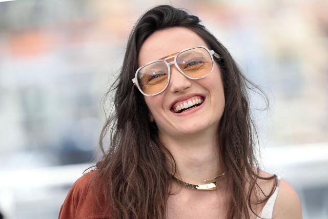 Italian actress Martina Scrinzi poses during a photocall of the film "Roma Elastica" at the 79th edition of the Cannes Film Festival in Cannes, southern France on May 21, 2026. (Photo by Valery HACHE / AFP)