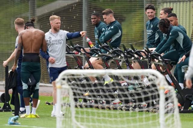Arsenal's English midfielder #20 Noni Madueke (L), Arsenal's Spanish defender #03 Christhian Mosquera ((C), Arsenal's Swedish striker #14 Viktor Gyokeres, Arsenal's English midfielder #41 Declan Rice, Arsenal's Italian defender #33 Riccardo Calafiori, Arsenal's Brazilian striker #09 Gabriel Jesus and Arsenal's English midfielder #10 Eberechi Eze take part in a team training session at London Colney, north of London, on May 21, 2026, as part of a media day ahead of their UEFA Champions League final football match against Paris Sain-Germain on May 30. (Photo by CARLOS JASSO / AFP)