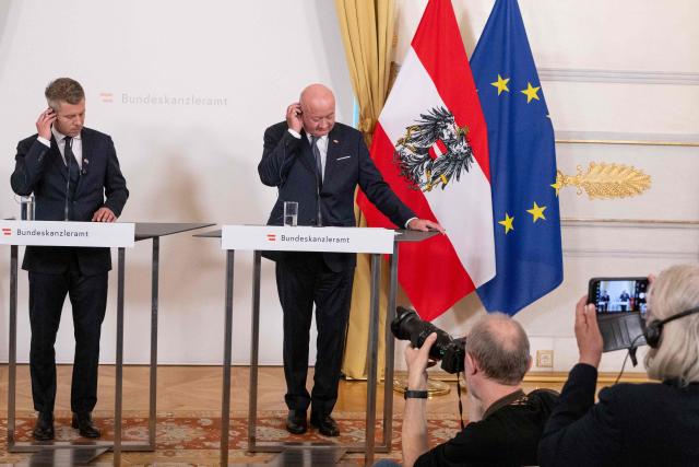 Austrian Chancellor Christian Stocker (R) and Hungarian Prime Minister Peter Magyar address a press conference during their meeting in Vienna, Austria, on May 21, 2026. (Photo by Joe Klamar / AFP)