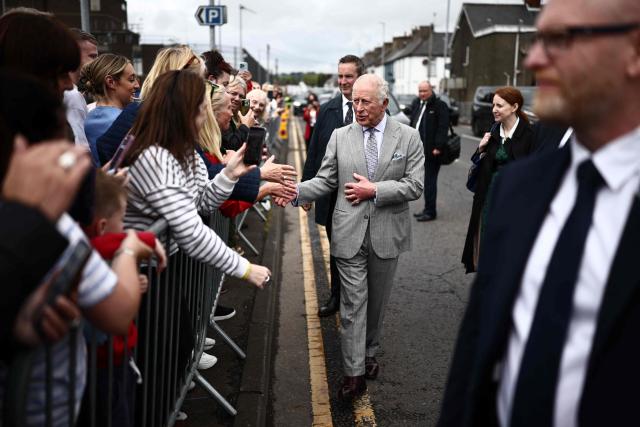 Britain's King Charles III meets well-wishers during a visit to Newtownards, Northern Ireland on May 21, 2026, on the final day of a three-day royal visit to Northern Ireland. (Photo by Henry NICHOLLS / POOL / AFP)
