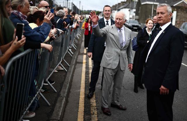 Britain's King Charles III meets well-wishers during a visit to Newtownards, Northern Ireland on May 21, 2026, on the final day of a three-day royal visit to Northern Ireland. (Photo by Henry NICHOLLS / POOL / AFP)