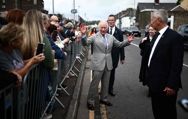 Britain's King Charles III meets well-wishers during a visit to Newtownards, Northern Ireland on May 21, 2026, on the final day of a three-day royal visit to Northern Ireland. (Photo by Henry NICHOLLS / POOL / AFP)