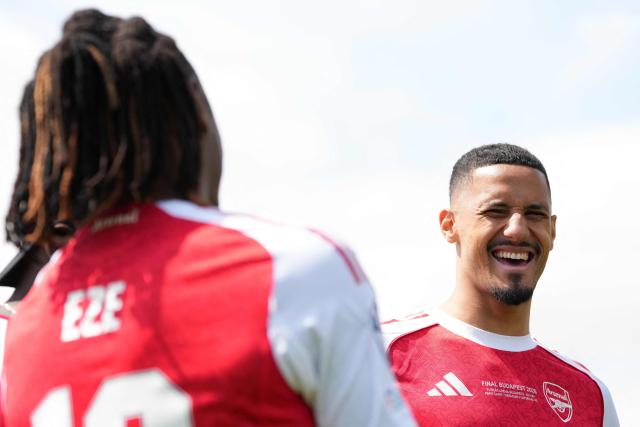 Arsenal's French defender #02 William Saliba smiles as he takes part in a media day, at London Colney, north of London, on May 21, 2026, ahead of their UEFA Champions League final football match against Paris Sain-Germain on May 30. (Photo by CARLOS JASSO / AFP)