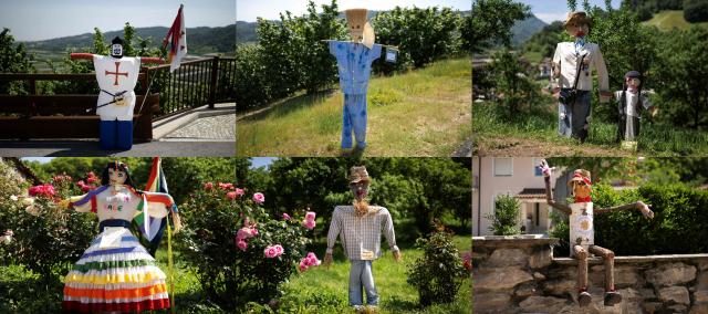 (COMBO) This combination of pictures created on May 21, 2026 shows scarecrows during the traditional "Scarecrows fair" in Castellar, near Cuneo, northern Italy.  During the annual fair, citizens prepare their own scarecrow and put them in the gardens, courtyards, fields and streets. (Photo by MARCO BERTORELLO / AFP)