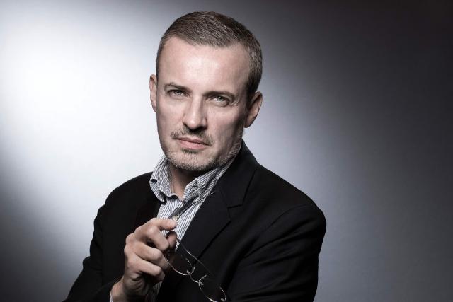 (FILES) French lawyer, writer and editor Emmanuel Pierrat poses during a photo session in Paris on March 18, 2018. The Parisian lawyer Emmanuel Pierrat has been on trial in Paris since May 21, 2026, on charges of psychological harassment, with sixteen of his former colleagues accusing him of insulting and terrorising them, of giving free rein to his verbal abuse, and of humiliating them by publicly disparaging their work. (Photo by JOEL SAGET / AFP)