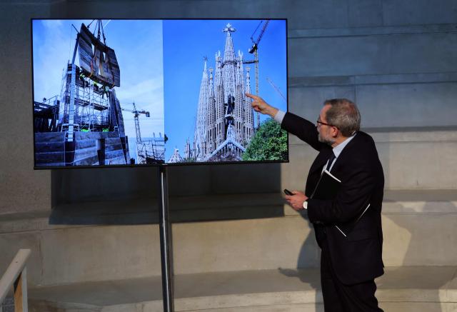 The architect director of the works of the Sagrada Familia basilica, Jordi Fauli gives a press conference on May 21, 2026 inside the temple in Barcelona. The Sagrada Familia basilica's central tower's cross crowns the world's tallest church at 172.5 meters, a temple conceived by Antoni Gaudi more than 140 years ago. (Photo by Thomas COEX / AFP)