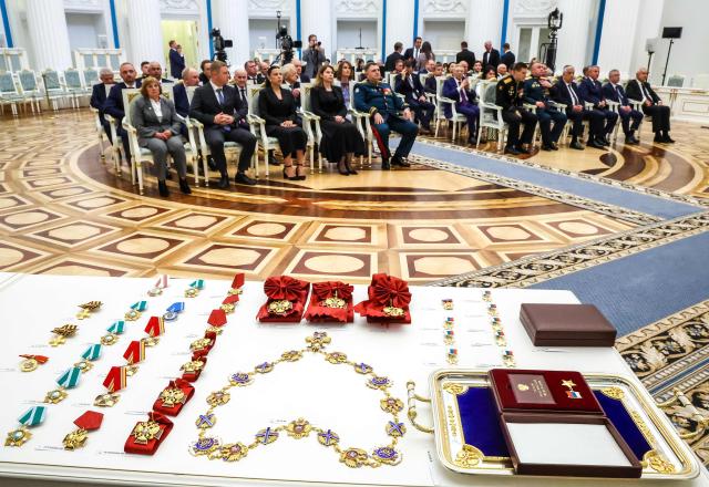 In this pool photograph distributed by the Russian state agency Sputnik, Participants attend a state awards ceremony hosted by Russia's President at the Kremlin in Moscow on May 21, 2026. (Photo by Vyacheslav PROKOFYEV / POOL / AFP)